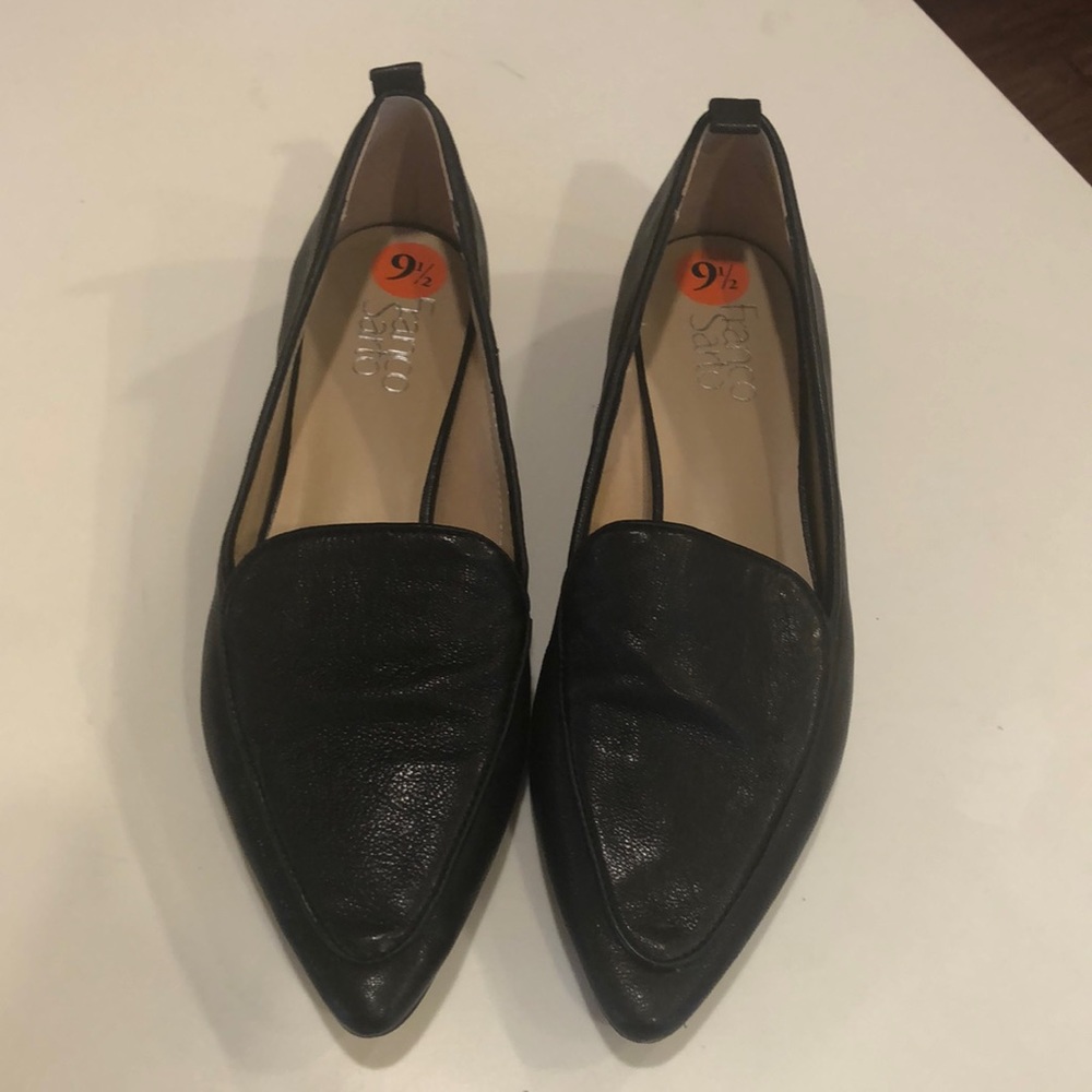 Black flats w/leather upper. Made by Franco Sarto